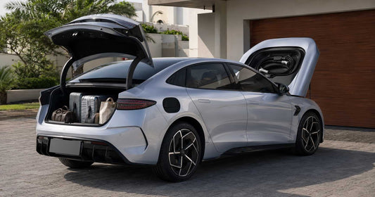 Silver BYD Seal sedan rear three-quarter view with boot lid open showing luggage capacity, highlighting the 400-litre cargo area and 60/40 split rear seats