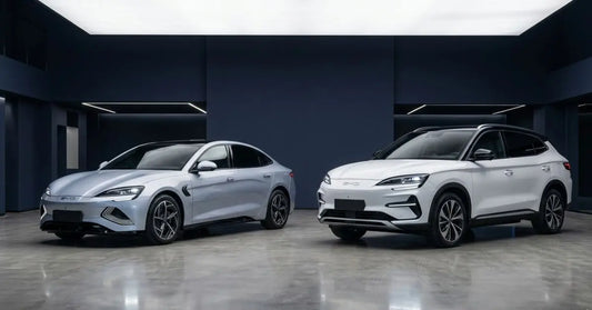 sleek BYD Seal silver electric sedan and a BYD Sealion 7 white electric SUV