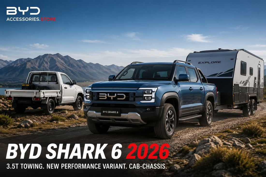2026 BYD Shark 6 Performance towing a caravan off-road showcasing 3500kg towing capacity and hybrid ute capability.