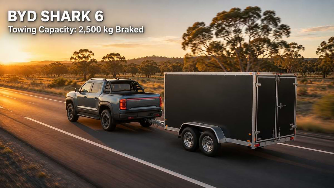 BYD Shark 6 towing an enclosed cargo trailer on an Australian highway at sunset with 2500kg braked towing capacity text overlay