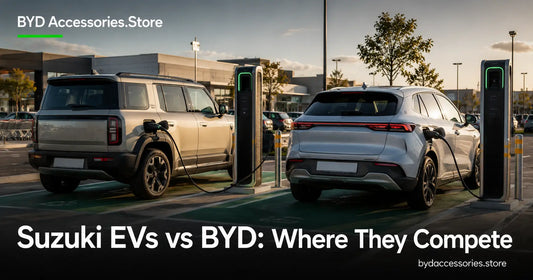 Two compact electric SUVs charging side by side representing where Suzuki's eVitara competes with BYD models