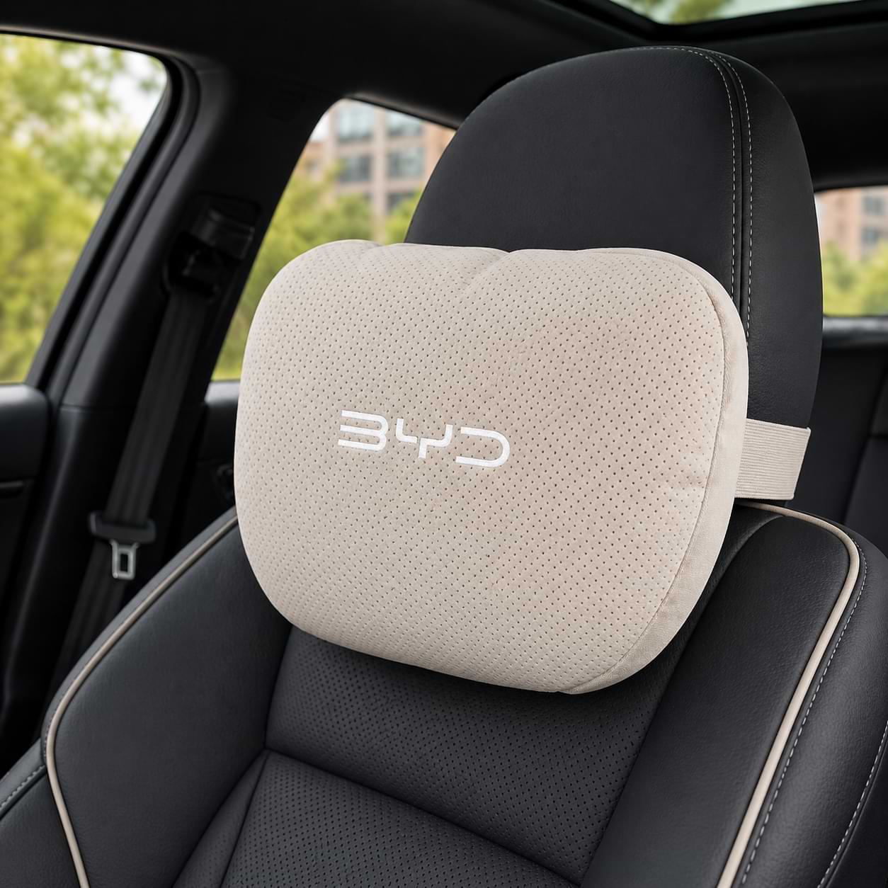 Car headrest pillow with BYD logo on a car seat