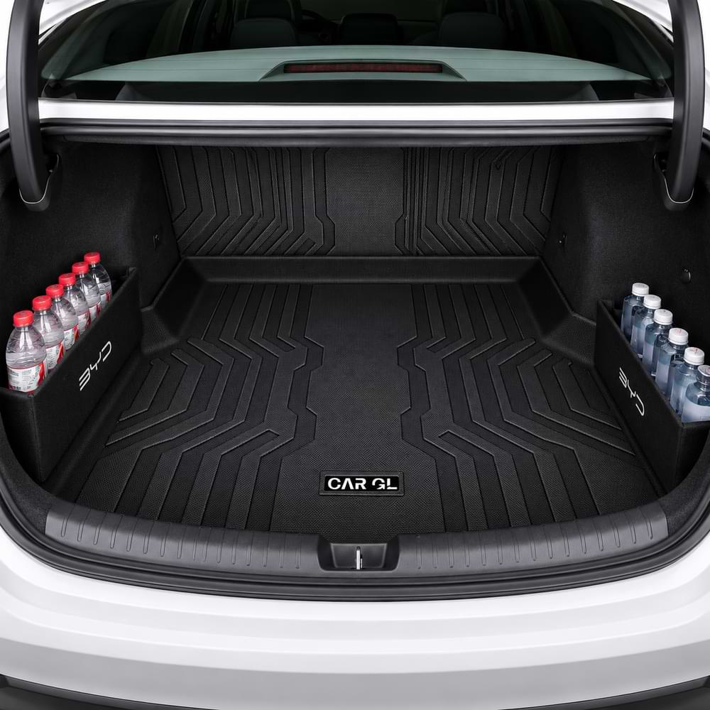 BYD_SEAL Car trunk with black floor mats and water bottles on a white car exterior.