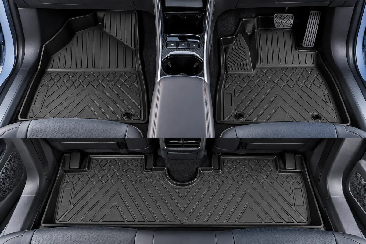 Moulded TPE floor mats installed across the front and rear footwells for practical all-weather interior protection.