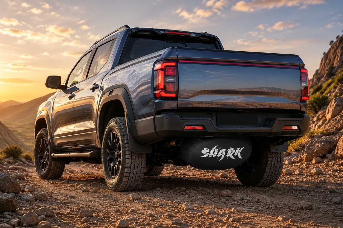 BYD Shark 6 off-road pickup truck with Shark logo spare tire cover mounted underneath rear chassis