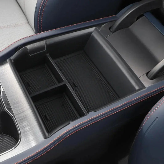byd Car console organizer with compartments in a vehicle interior.